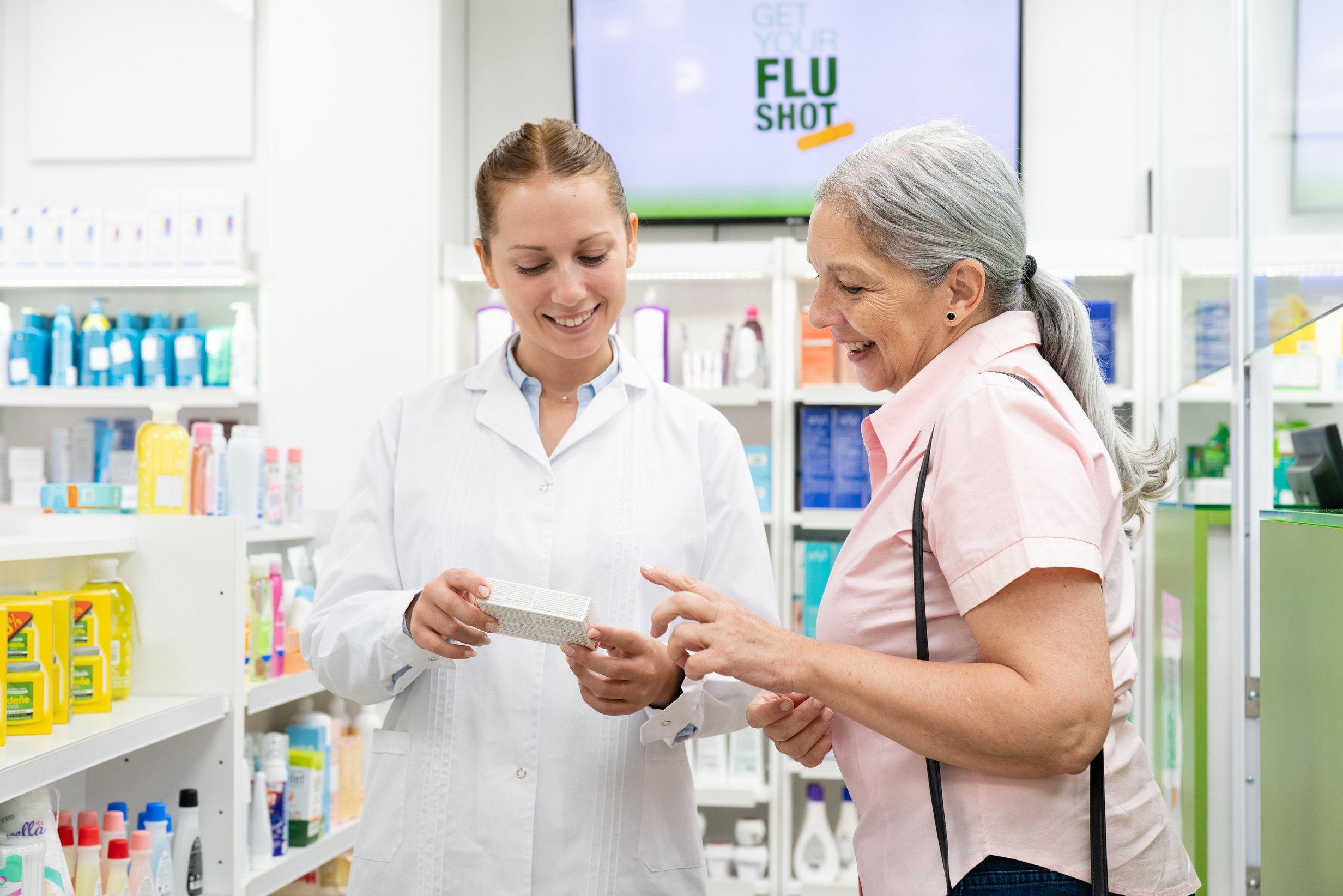 Pharmacist helping customer